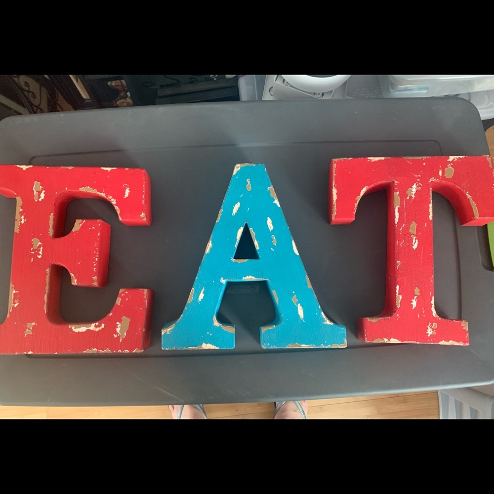 Distressed ‘EAT’ letters